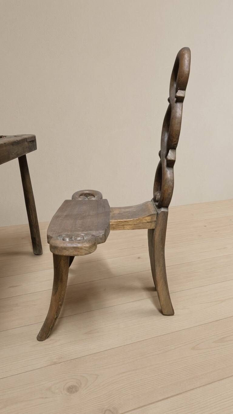 Vintage sculptural wooden table and two chairs, hand-carved loop backrests