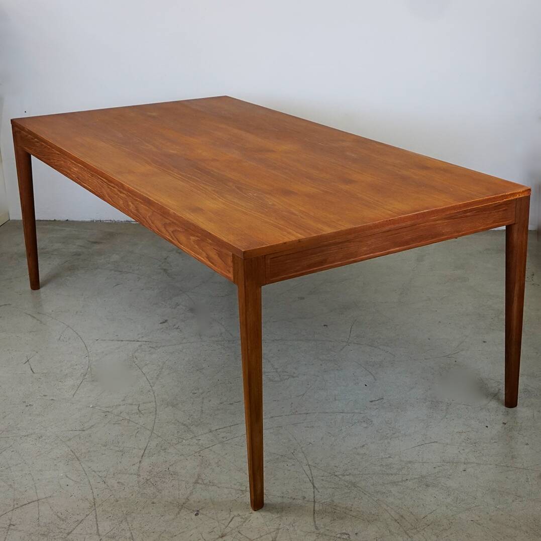 The modern Scandinavian teak dining table Diplomat by Finn Juhl for France and Son.