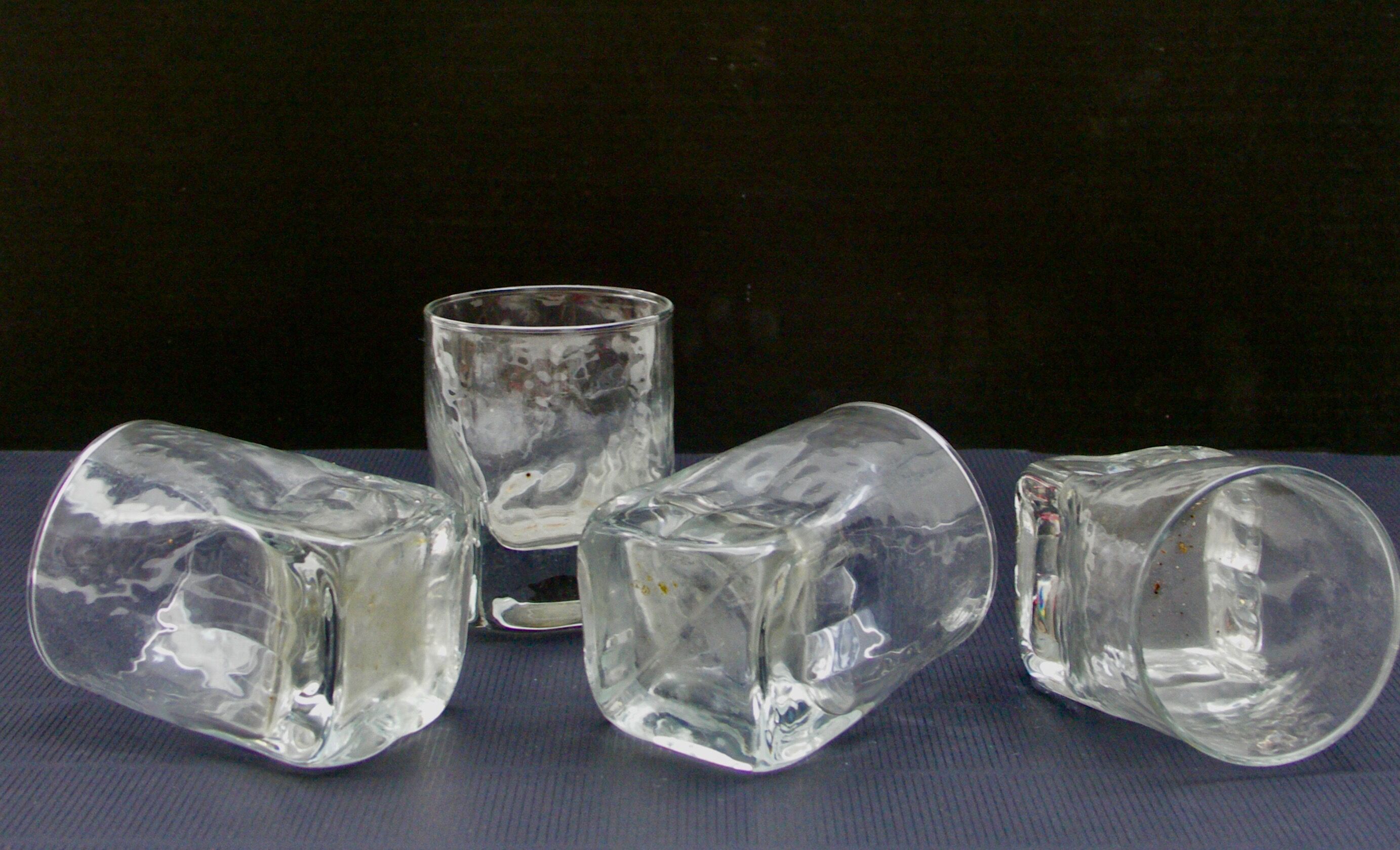Four whisky glasses
