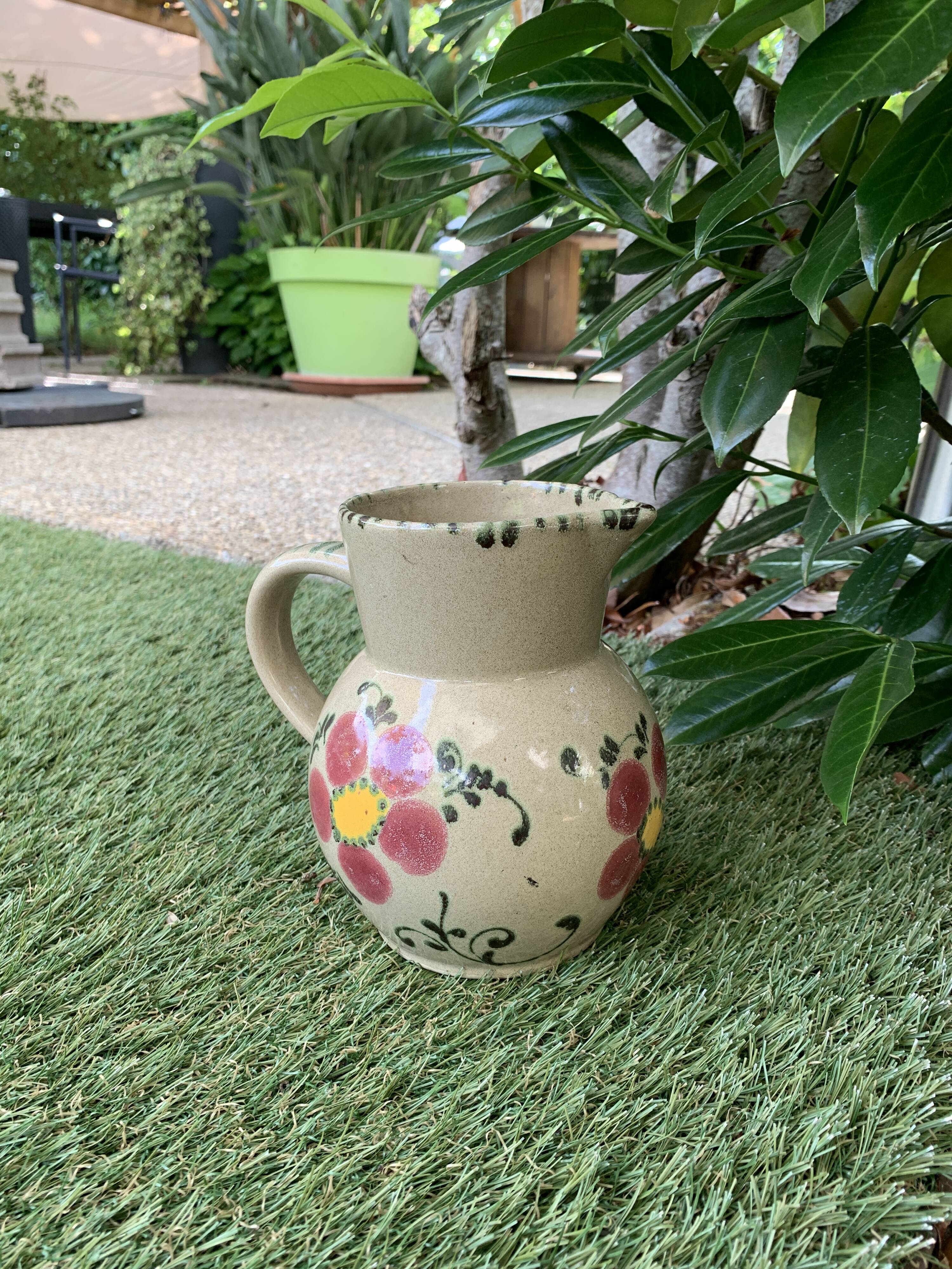 Vintage ceramic pitcher model flowers