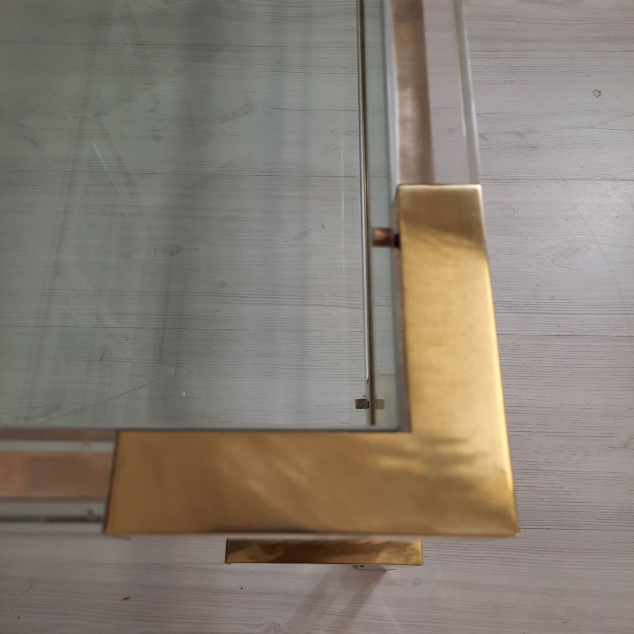 Coffee table with sliding shelf in lucite, brass and glass, Hollywood Regency