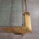 Coffee table with sliding shelf in lucite, brass and glass, Hollywood Regency