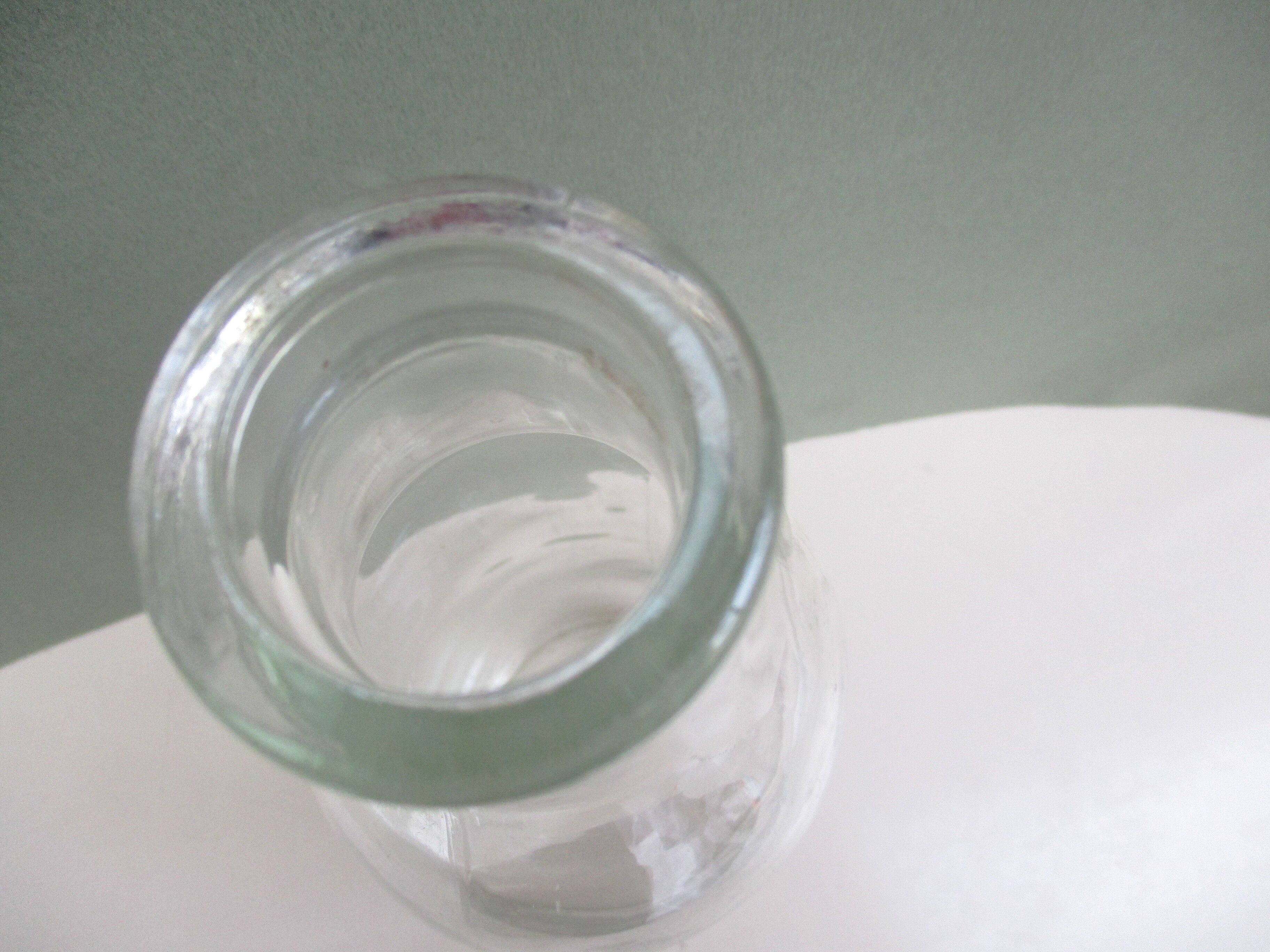 Vintage milk bottle in clear glass