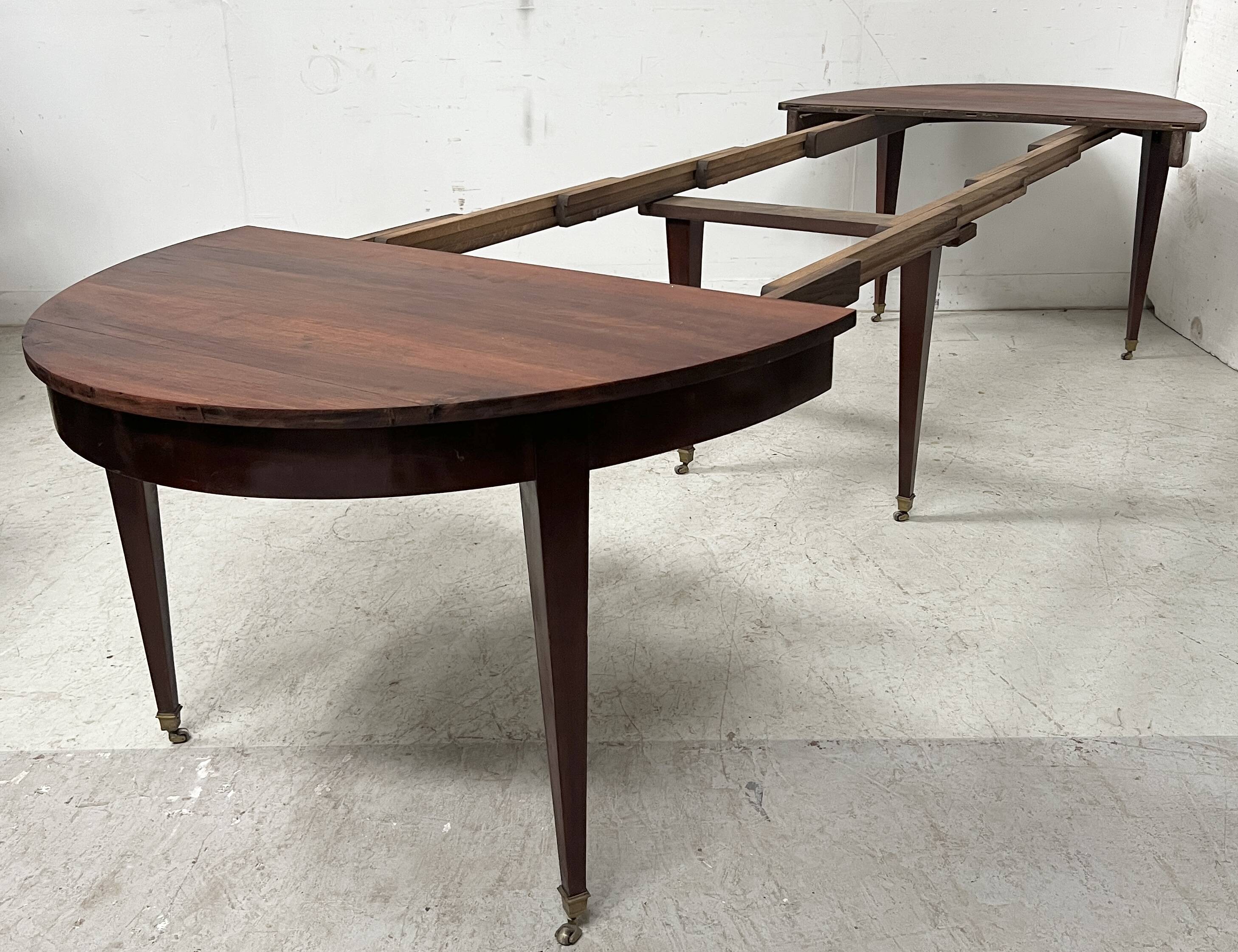 Louis XVI style bandeau table with 6 XIX century tapered legs.
