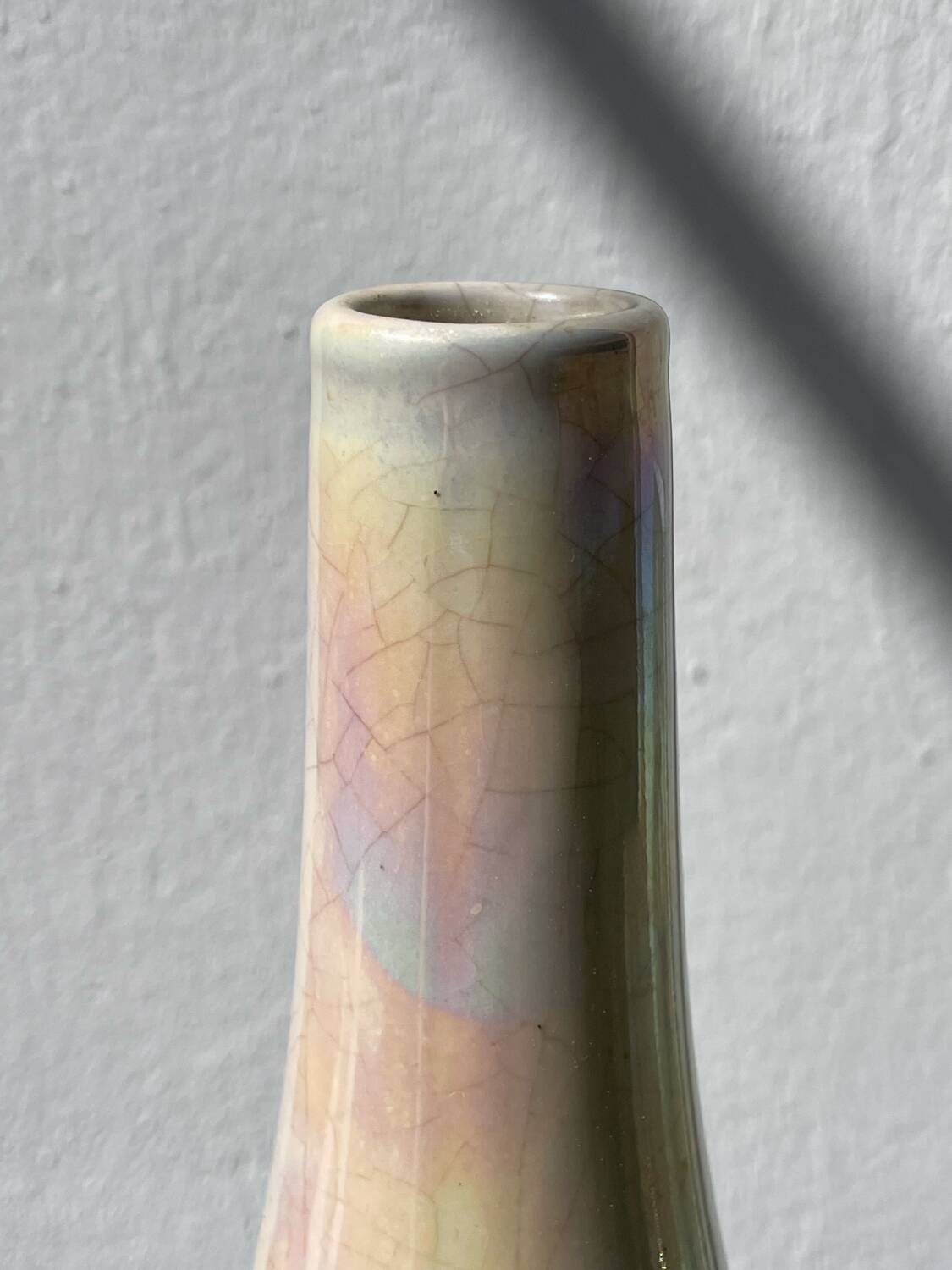 Iridescent white ceramic vase