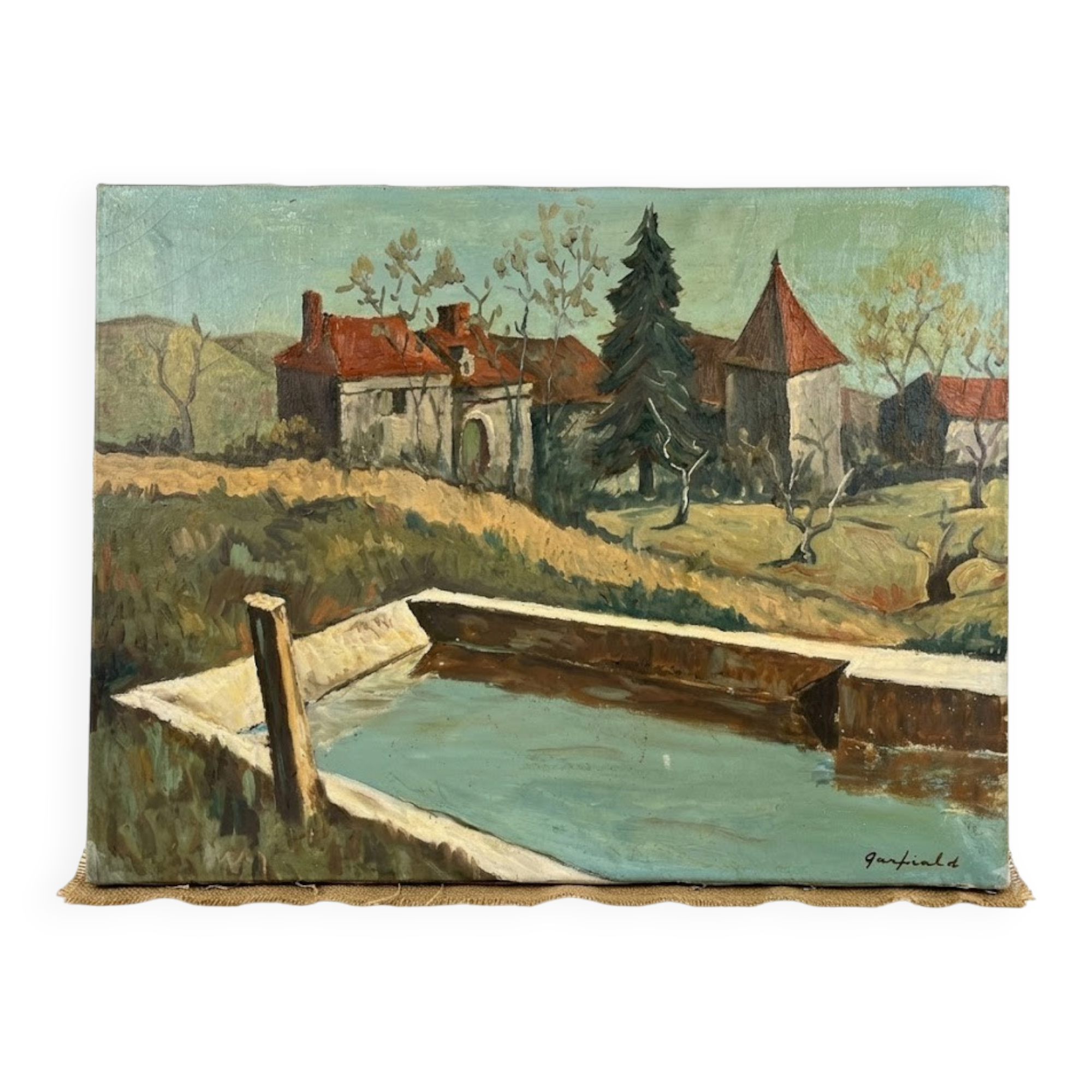 Provençal landscape tableau with a basin signed Janfield.