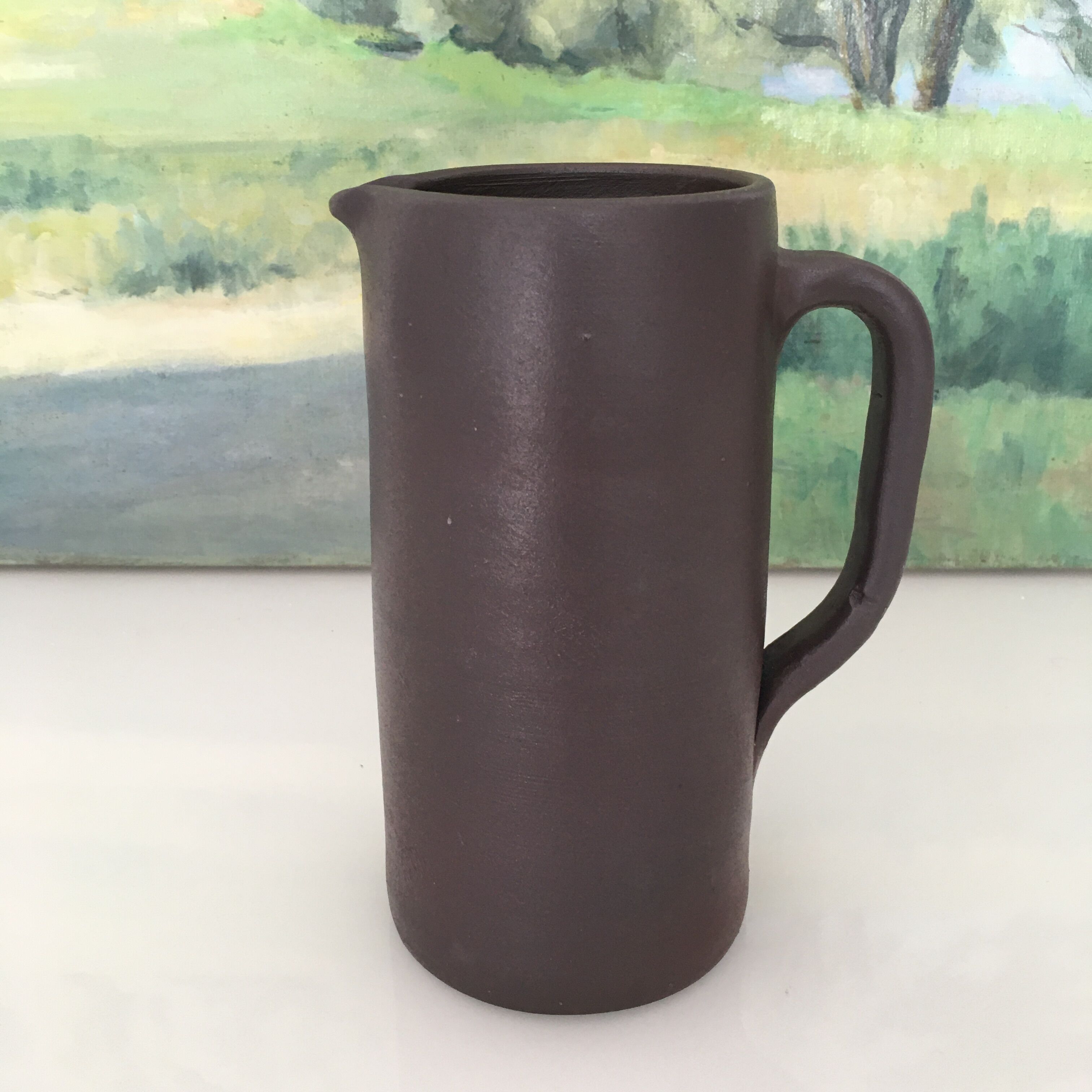 Dark brown sandstone pitcher