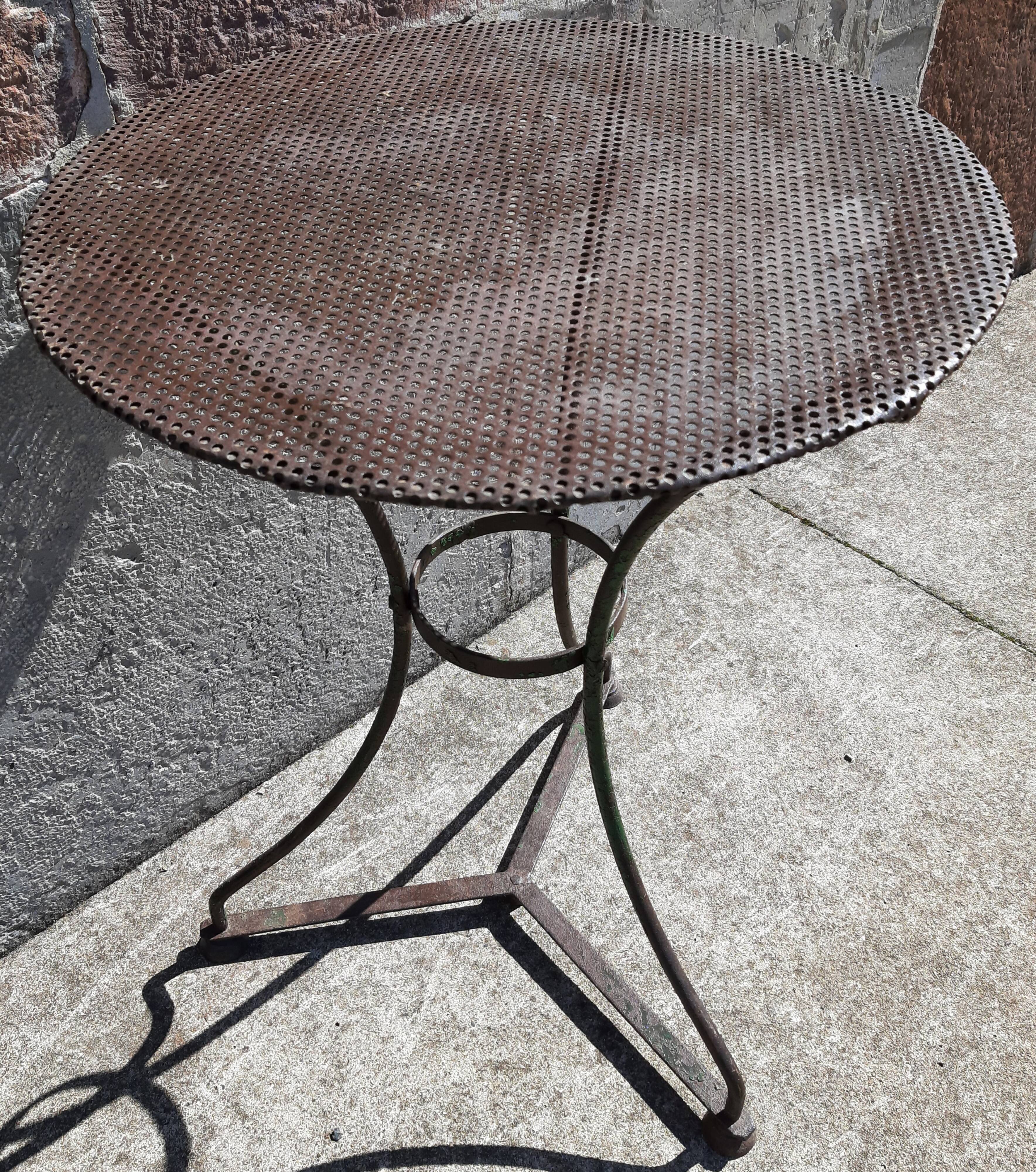 Wrought iron pedestal table