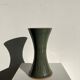 Dark green handcrafted vase with glazed ceramic grass blades