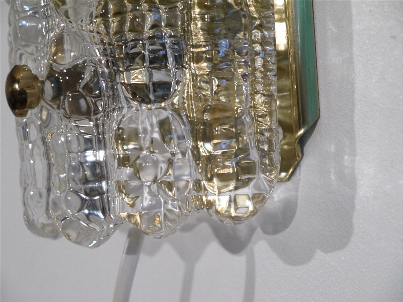 Pair of crystal and brass wall lamps by Carl Fagerlund for Orrefors