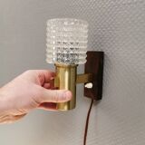 A set of Danish wall lamps, from the 1970s, in rosewood, aluminum and with pressed plastic shades