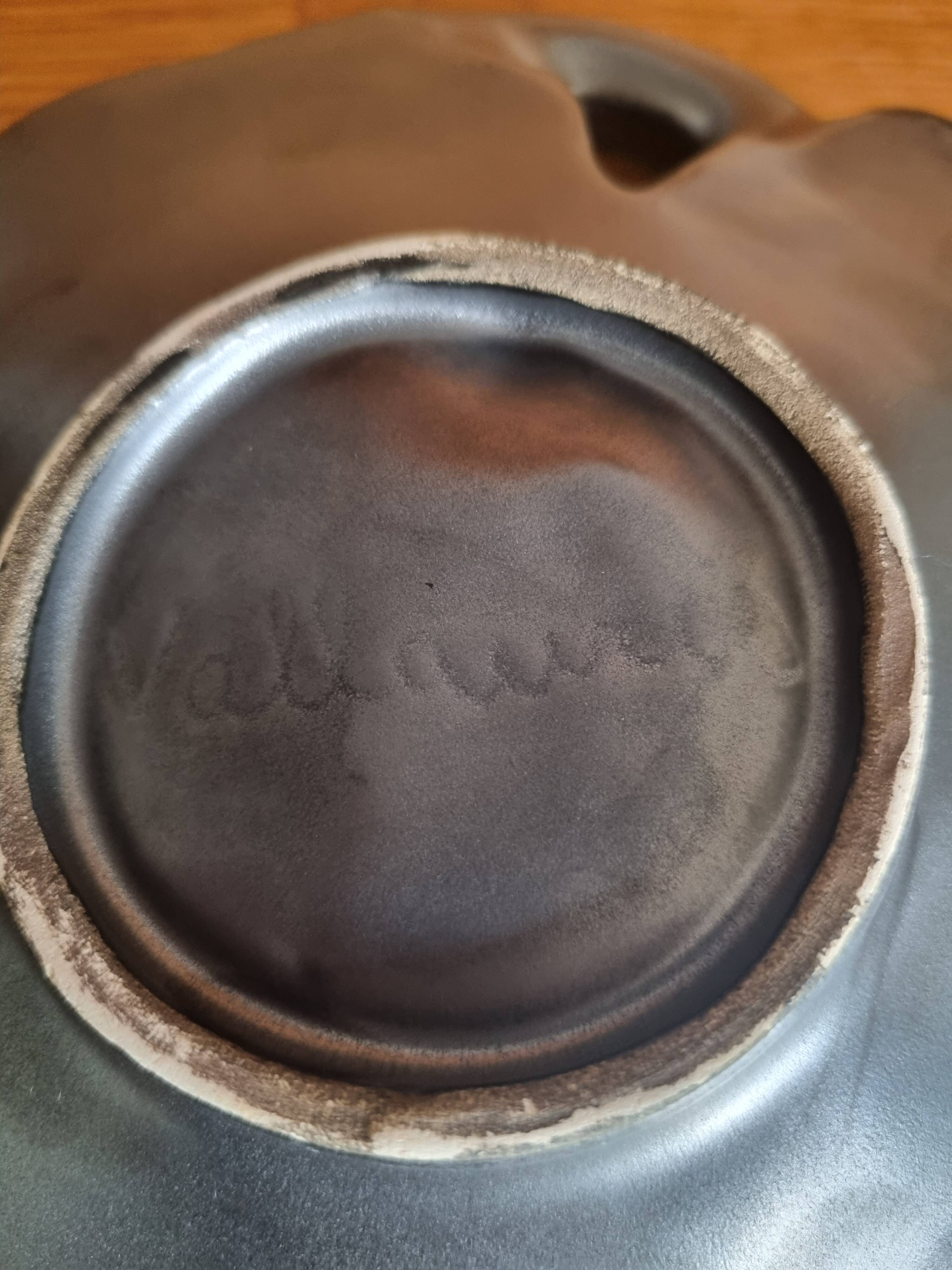 Vintage 1950s Vallauris black matte ceramic pocket bowl.