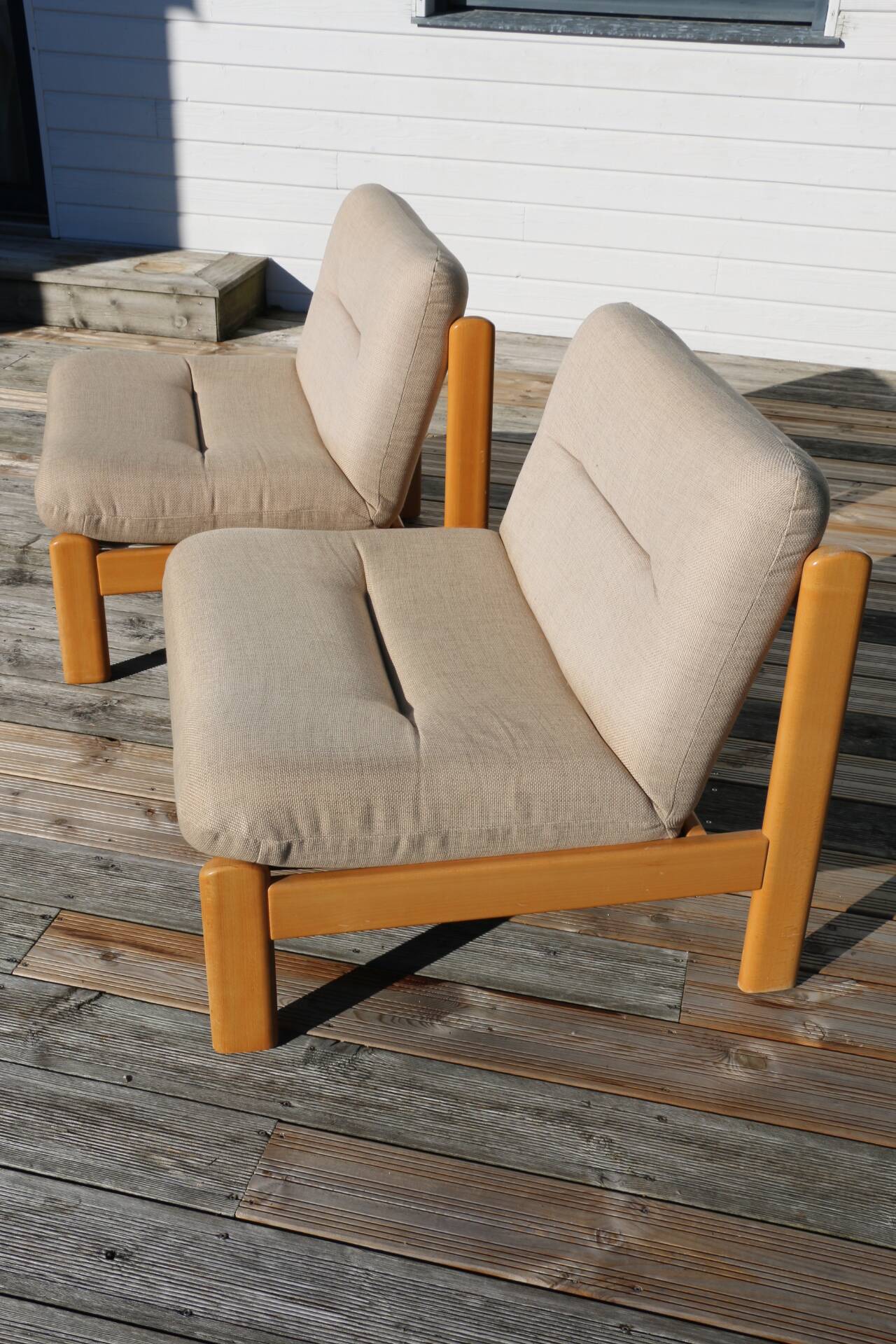 Pair of wood and fabric lounge chairs, 1980