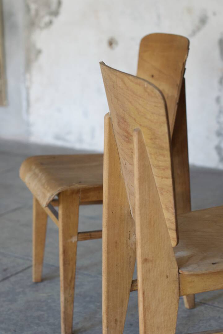 two  style wooden chairs