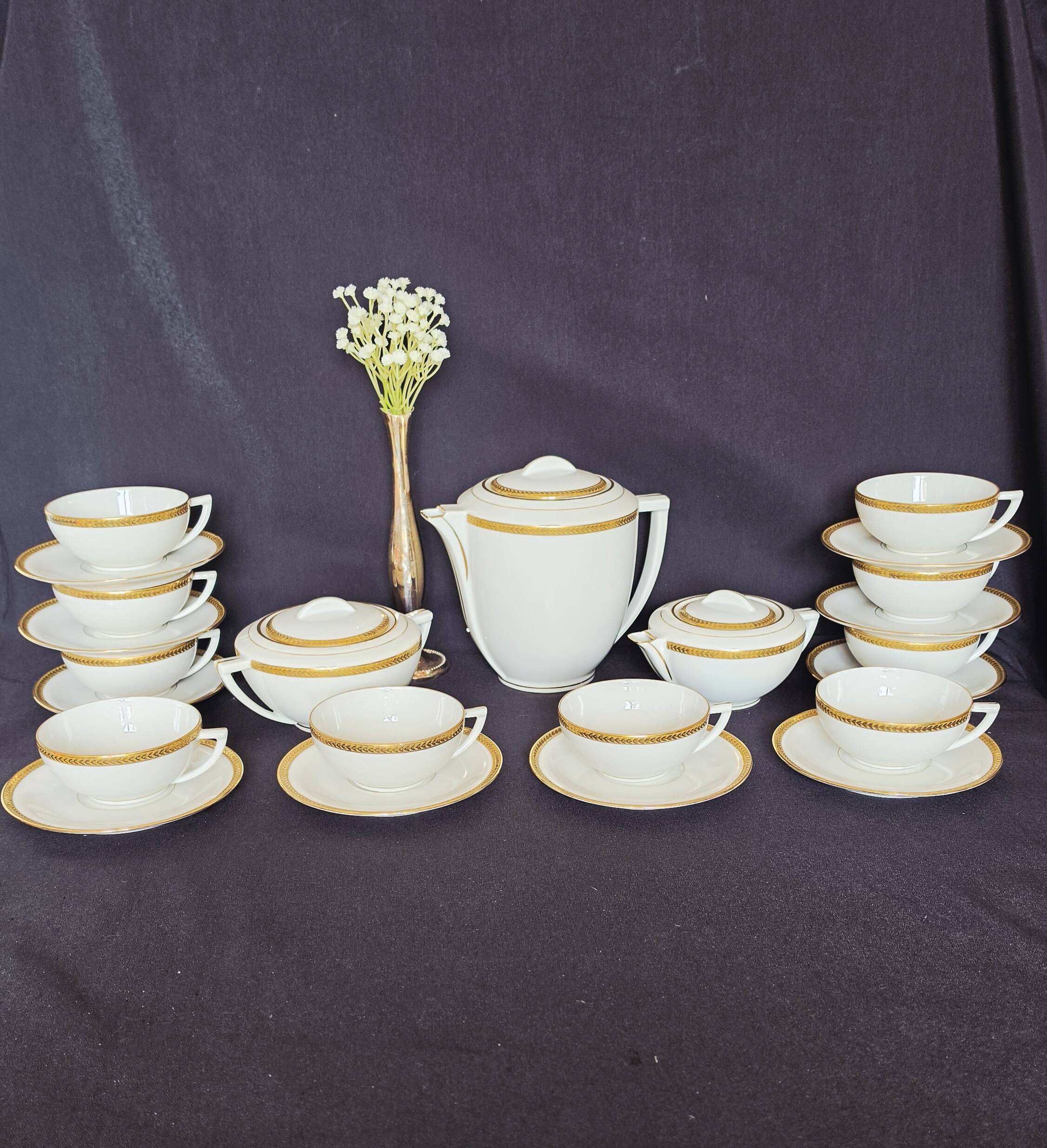 Coffee or tea service in Limoges porcelain and gold, France, Art style.