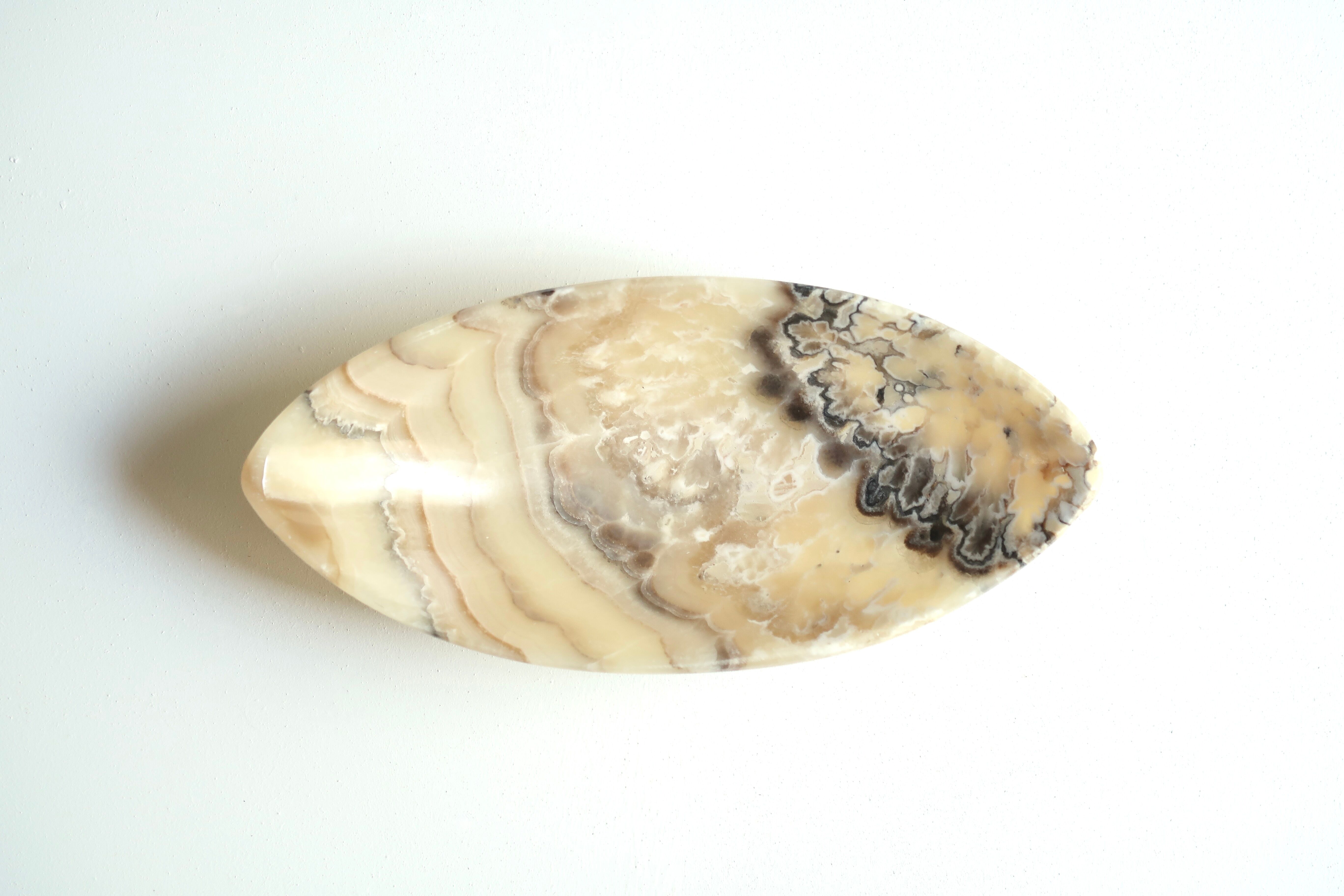 Mexican tidy in carved stone, 70s