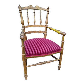 Antique armchair in gilded wood twentieth