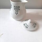 Vintage cream pot with Art Deco pattern and its lid.
