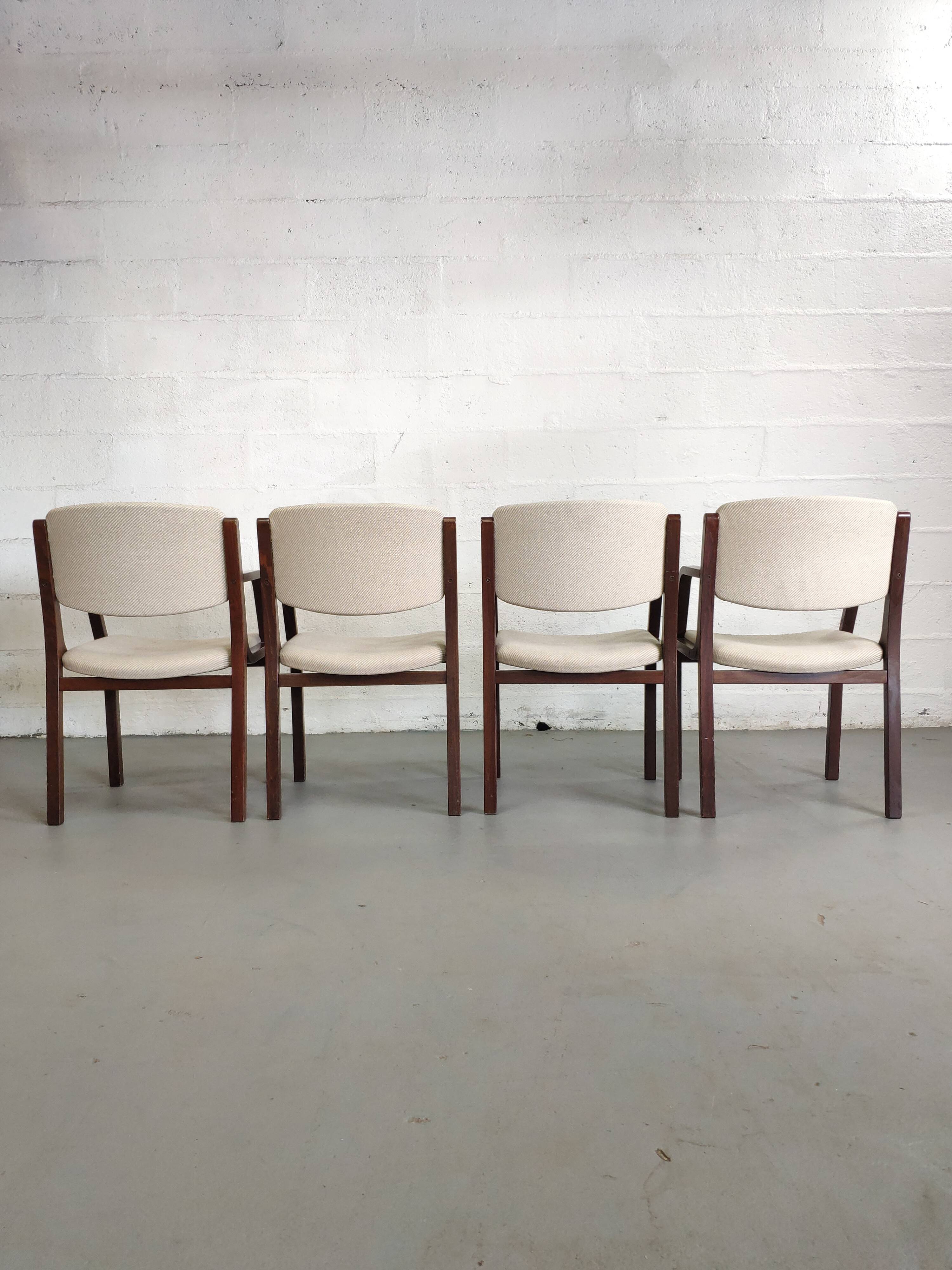 4 wooden and fabric chairs
