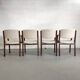 4 wooden and fabric chairs