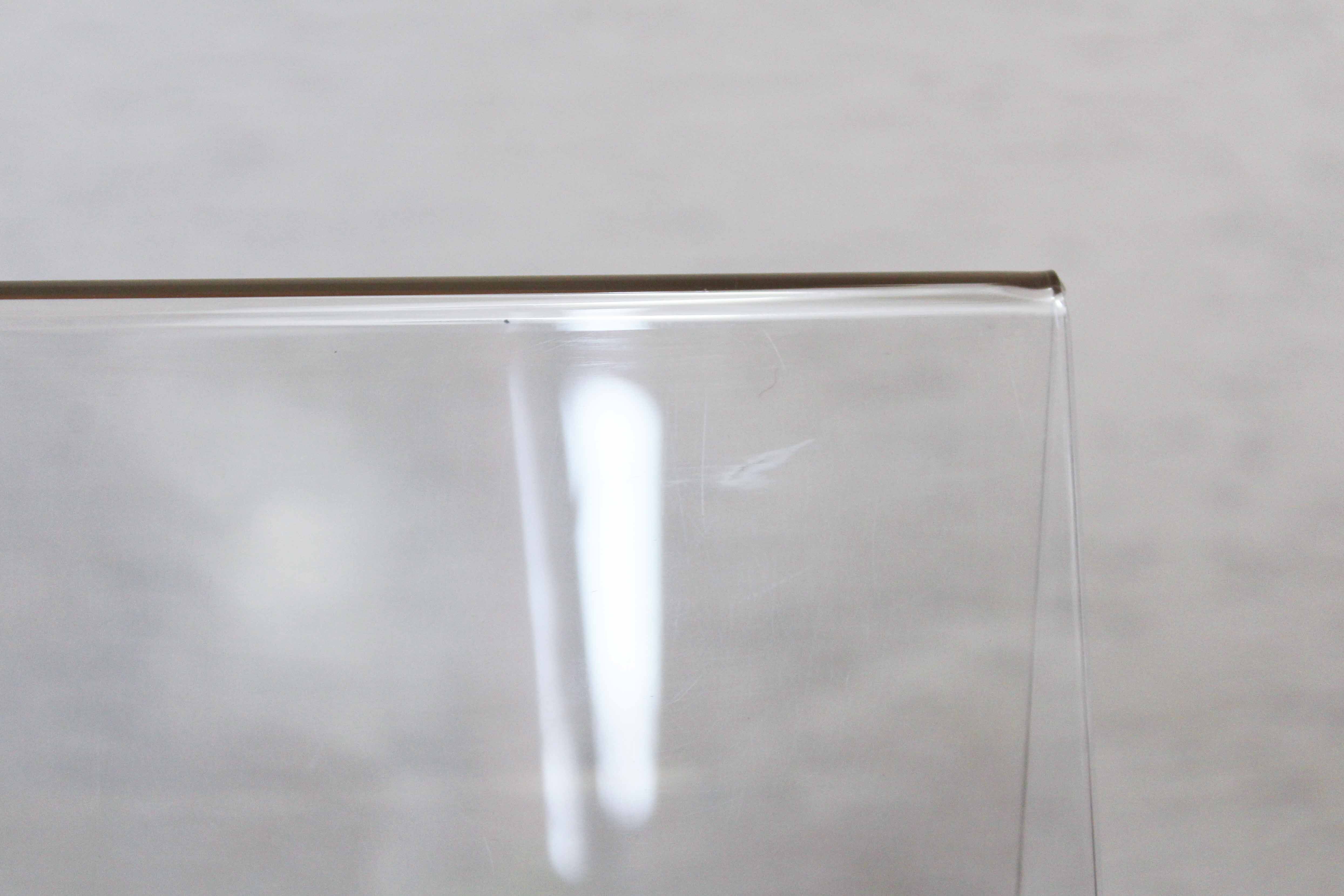 Plexiglas and brass magazine holder