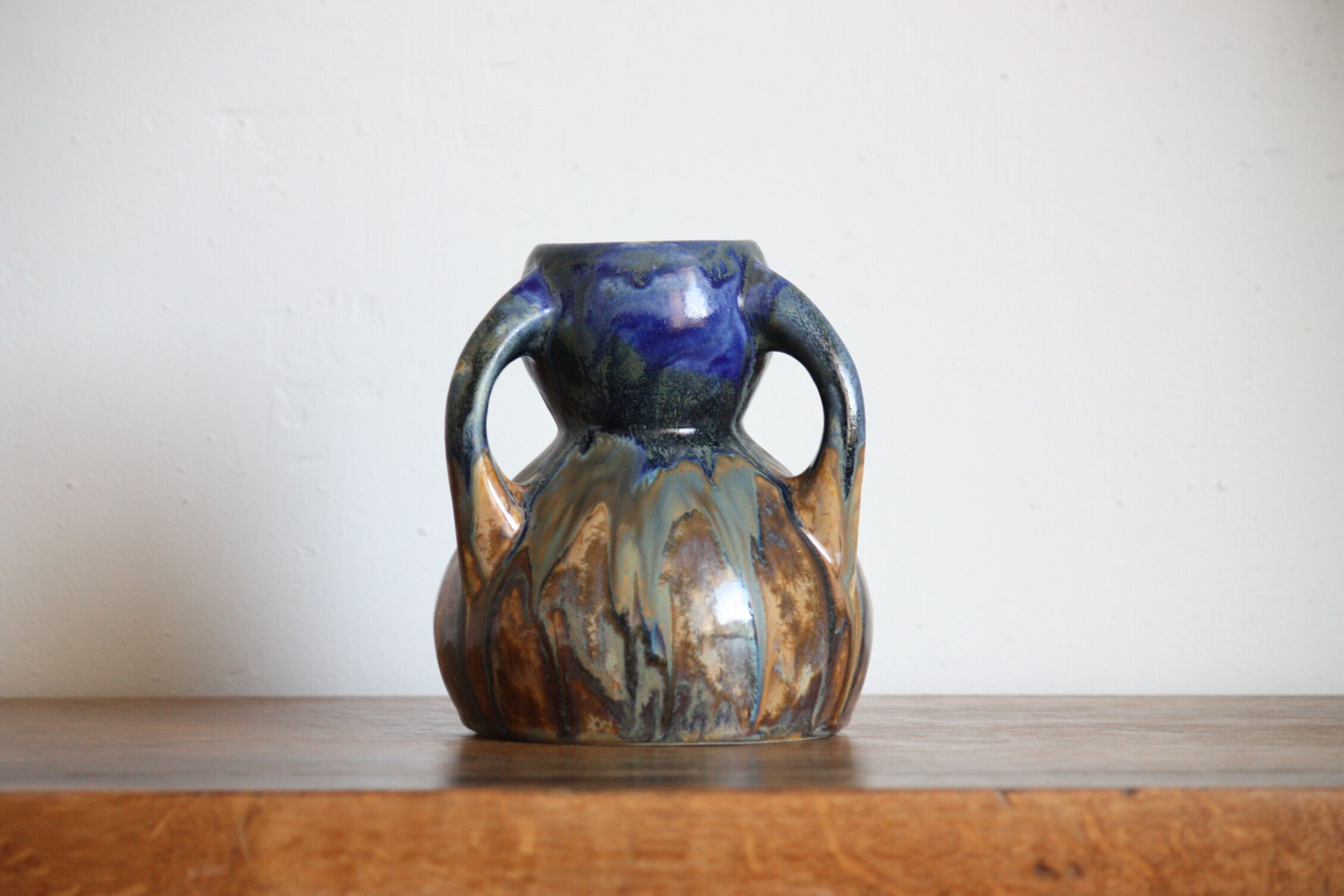 Blue vase in flaming sandstone