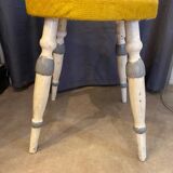 Old stool early 20th century wooden legs and round padded seat