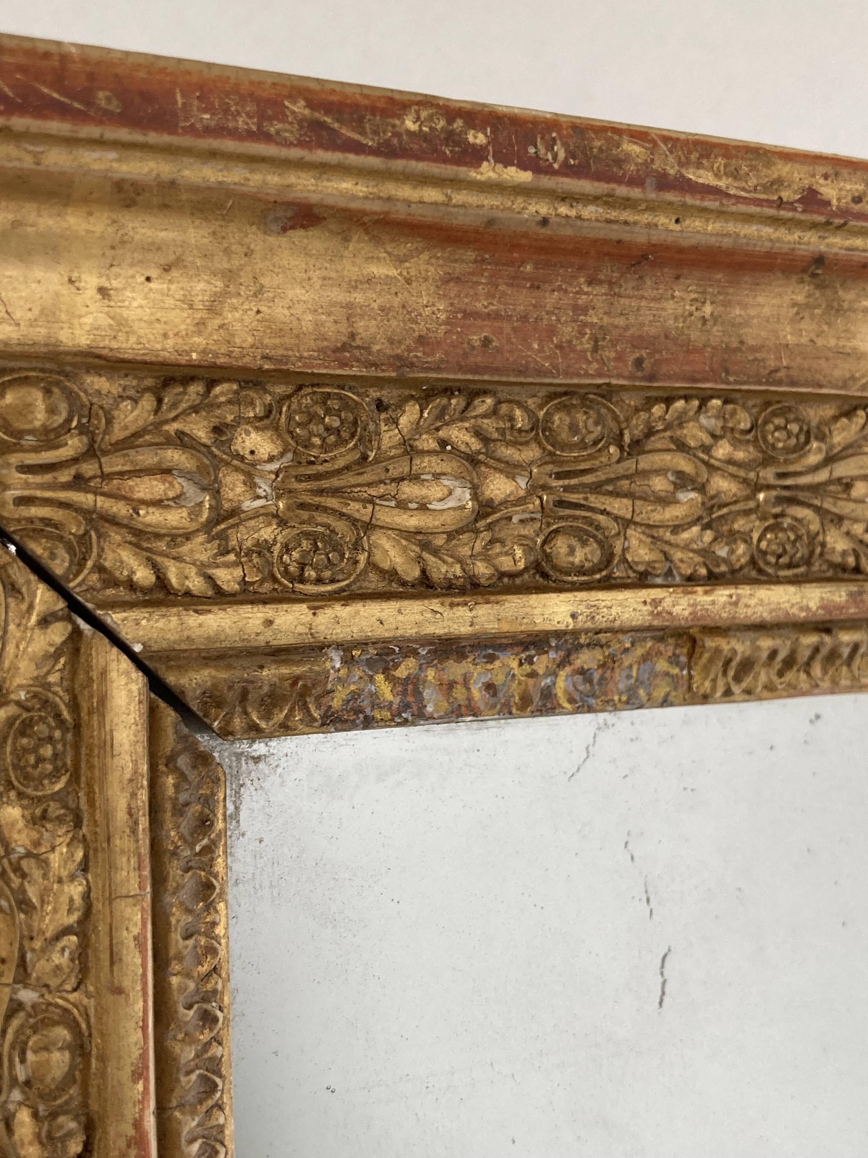 Petit miroir en bois stuqué et doré d’époque Restauration