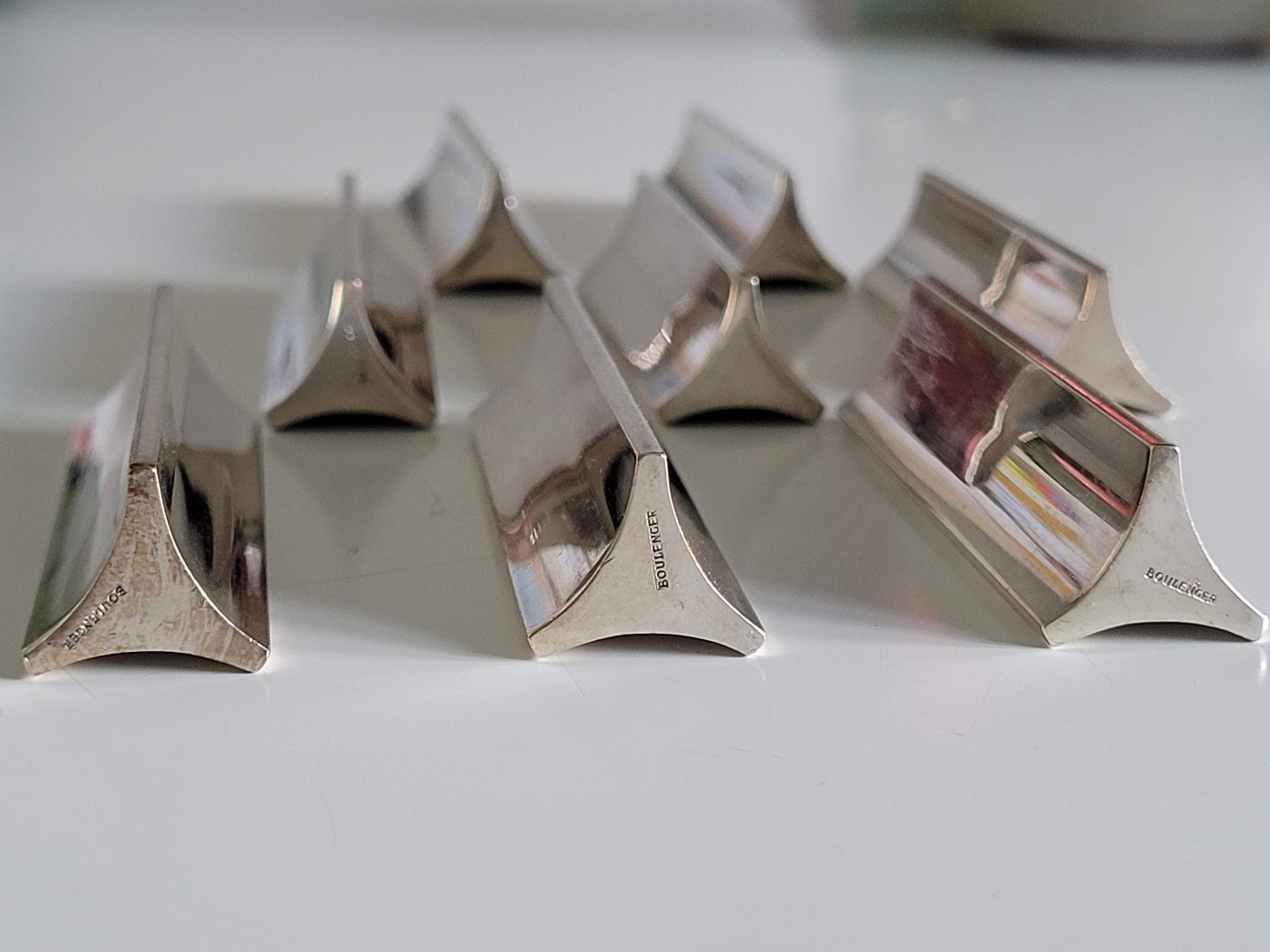 Eight Boulenger knife holders in art deco silver metal