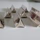 Eight Boulenger knife holders in art deco silver metal