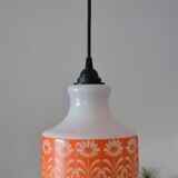 Seventies chandelier in white opaline decorating orange flowers