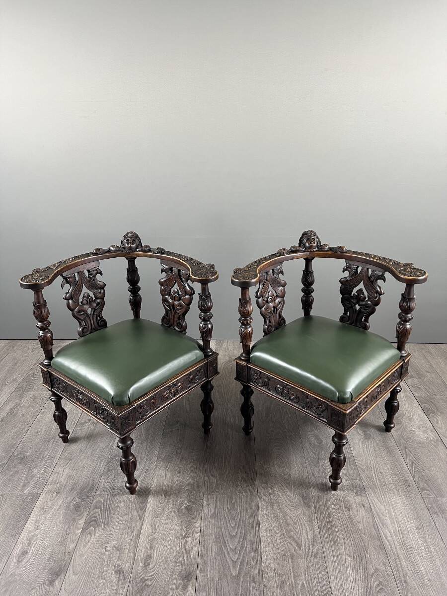 Pair of corner armchairs in carved wood, 19th century