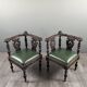 Pair of corner armchairs in carved wood, 19th century