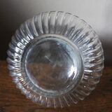 Round-bellied glass carafe with ribbed neck.