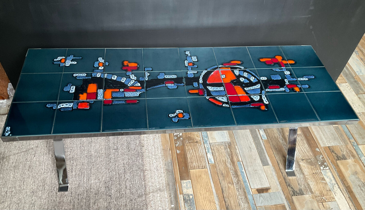 Coffee table in signed ceramic and chromed metal 70s