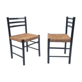 Ensemble de 2 chaises modernistes noires et de paille, années 1960