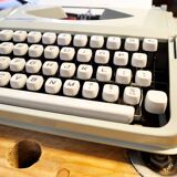 Blue green baby hermes typewriter