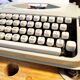 Blue green baby hermes typewriter