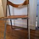 2 Chromed metal and leather folding chairs. 70s. Fontoni & Geraci