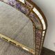 Large vintage brass and glazing bead mirror