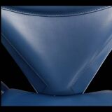 Armchairs covered in vintage blue leather