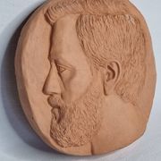 Bas-relief mural in terracotta, profile of a man, signed, 21 x 20 cm, 1984.