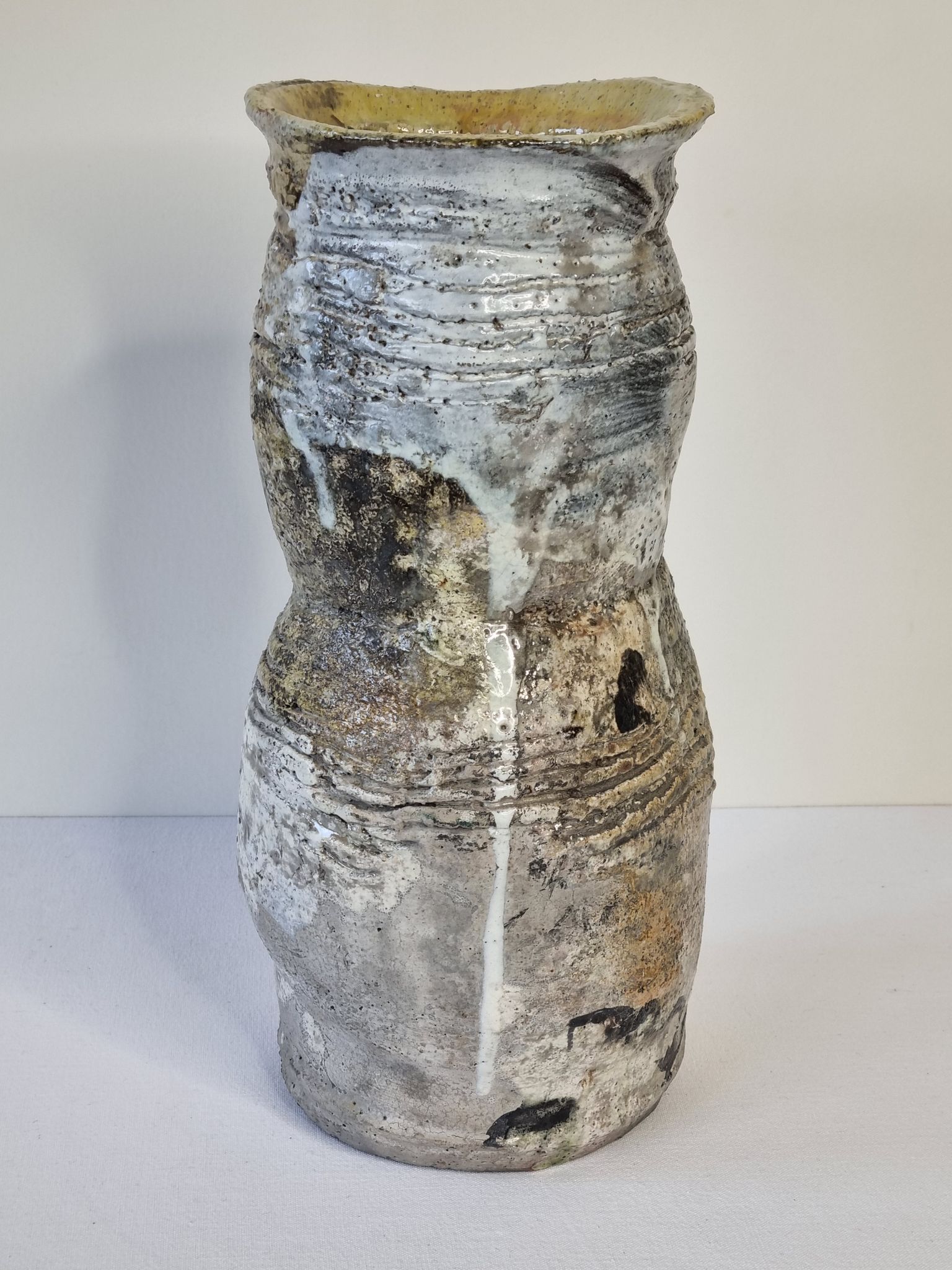 Enamelled ceramic roll vase