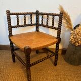 Corner chair in turned wood and straw