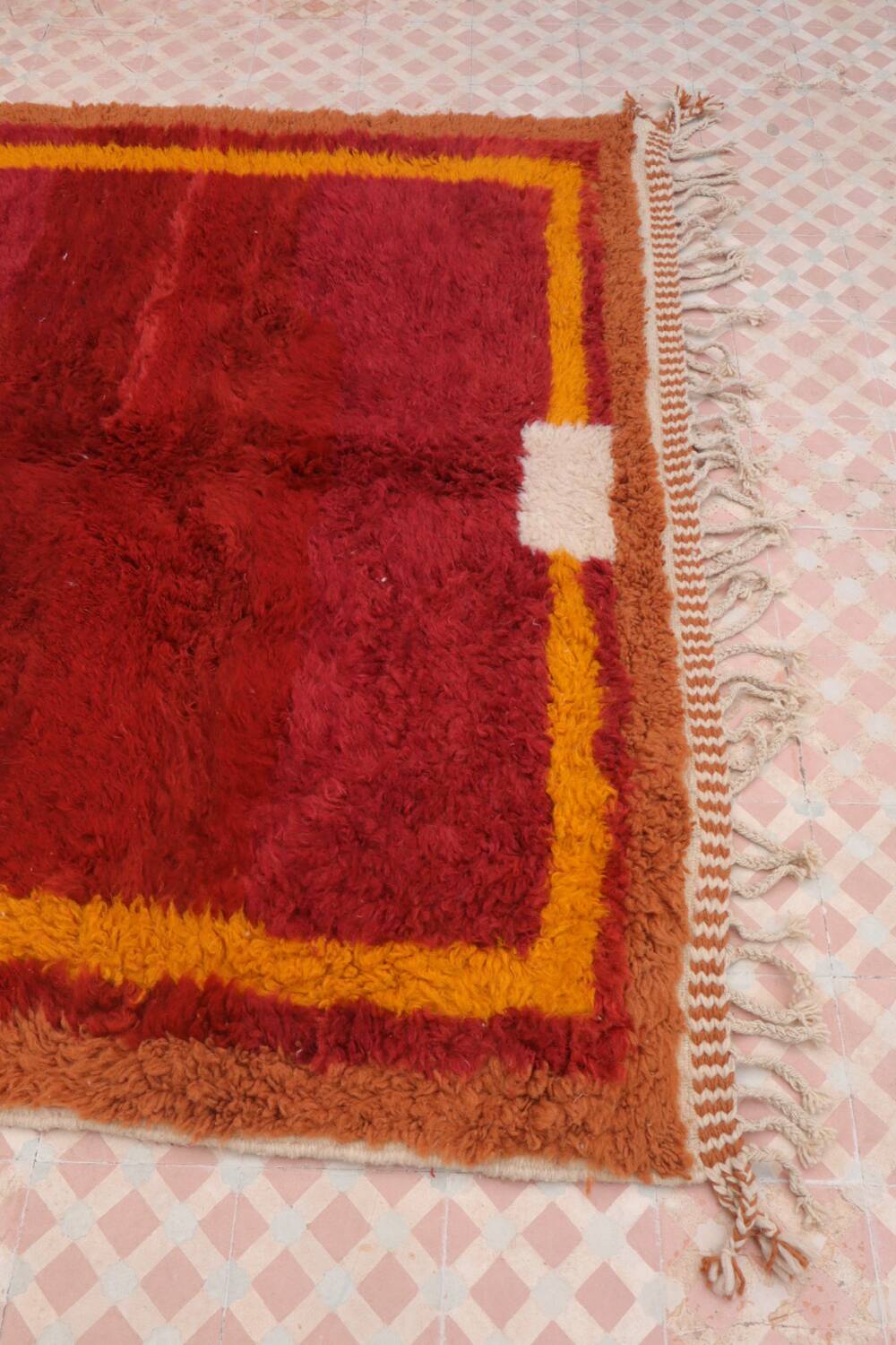 Minimalist burgundy cherry red shaggy berber rug