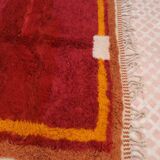 Minimalist burgundy cherry red shaggy berber rug