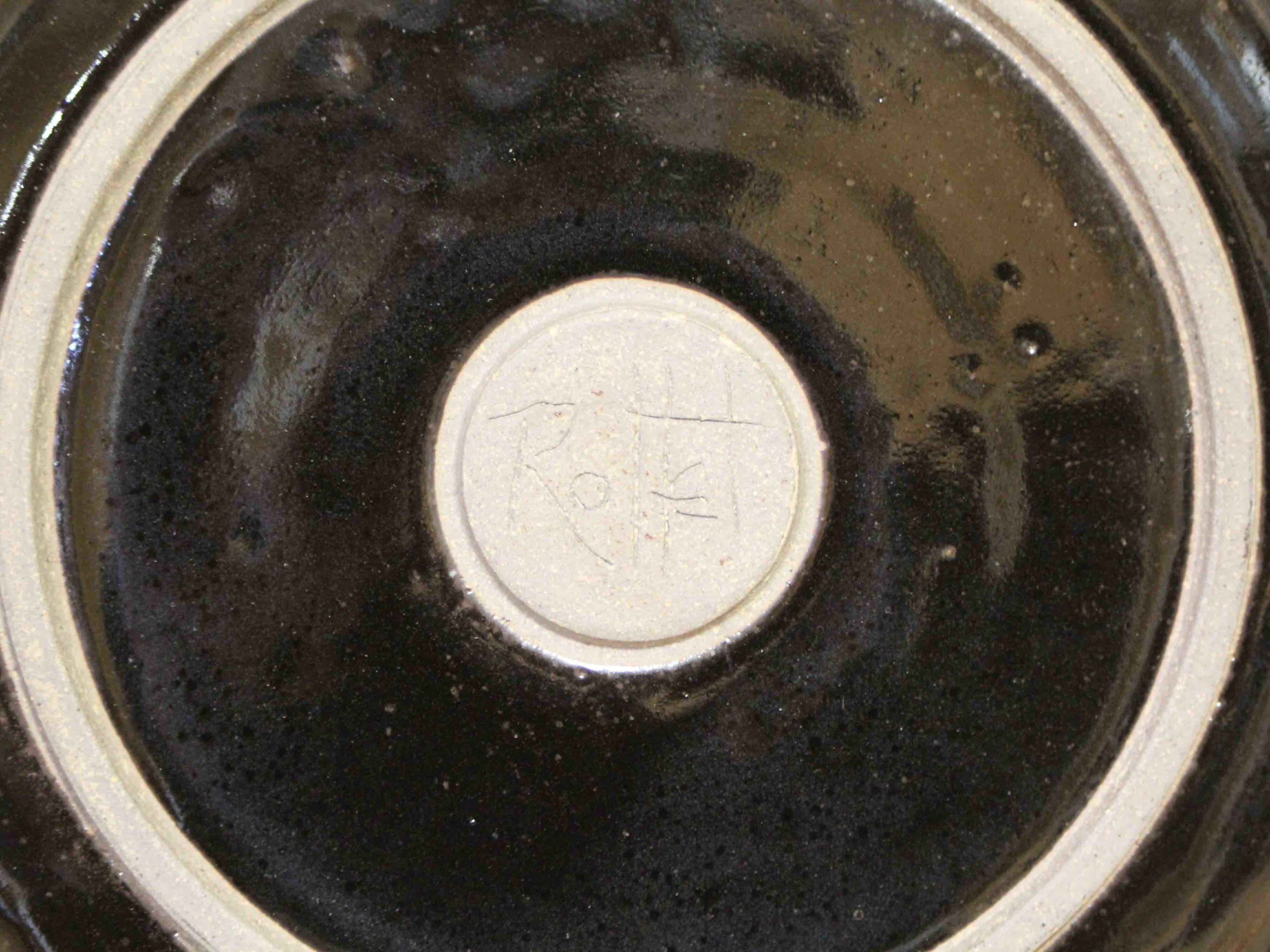 Decorative glazed stoneware plate by Patrick Rollet