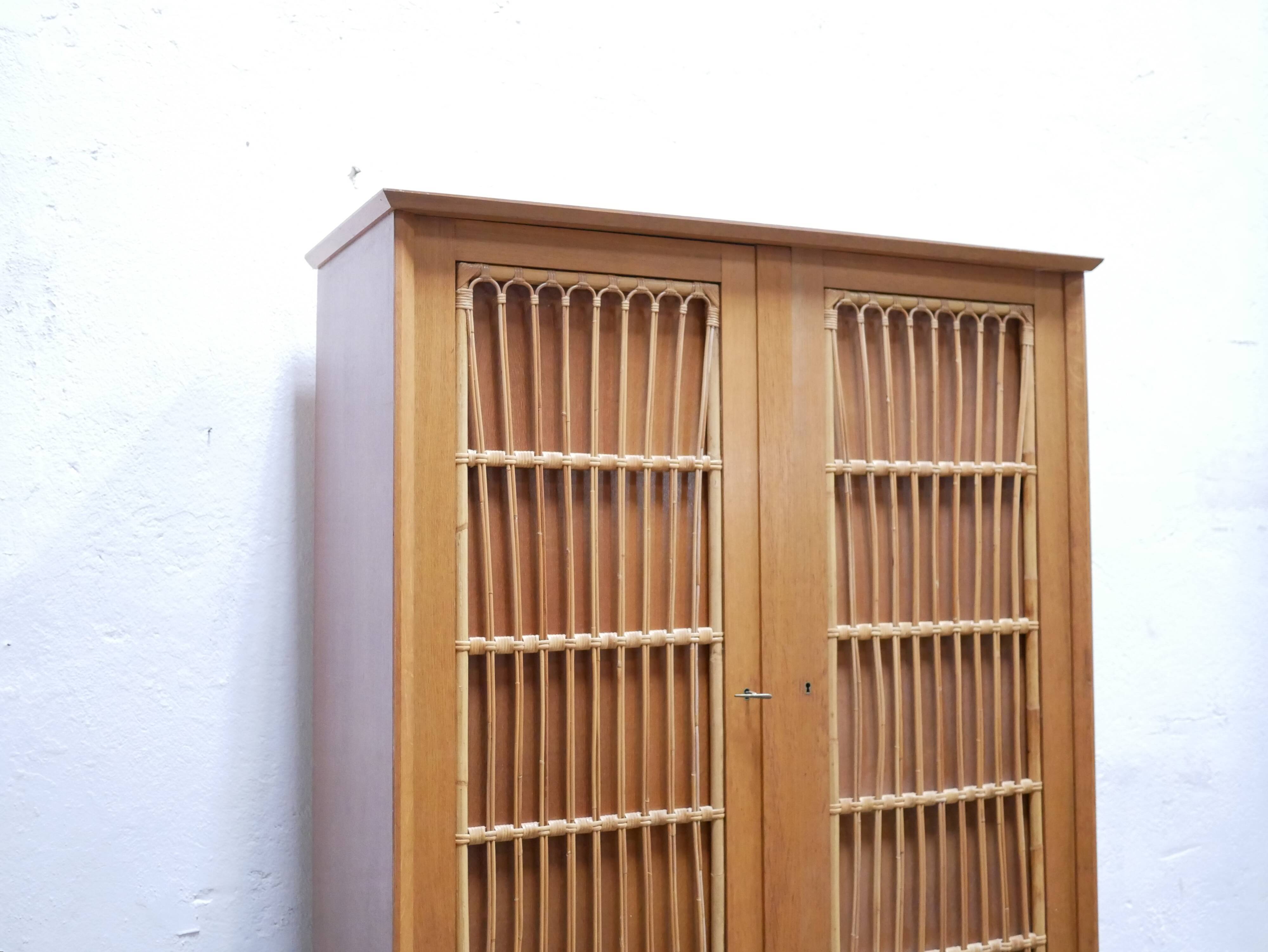 Vintage wardrobe in wood and rattan