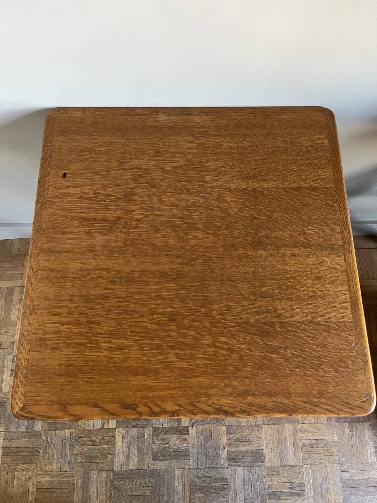 Superb square table made of solid oak from the 1960s, with a cast iron bistro base.