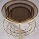 Set de trois tables basses gigognes en bronze et verre fumé, années 70